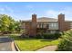 Charming brick townhouse with a well-manicured lawn and beautiful landscaping, perfect for low-maintenance living at 8955 Stonegate Rd # A, Indianapolis, IN 46227