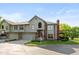 Charming townhome with attached two-car garage and well-manicured lawn at 8955 Stonegate Rd # A, Indianapolis, IN 46227
