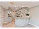 Kitchen with white cabinets, granite countertops, and stainless-steel appliances at 8955 Stonegate Rd # A, Indianapolis, IN 46227