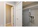 Convenient laundry room with closet, open shelving and connections at 8955 Stonegate Rd # A, Indianapolis, IN 46227