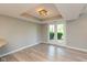 Living room features access to the patio with a sliding glass door at 8955 Stonegate Rd # A, Indianapolis, IN 46227