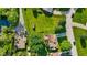Aerial view of the property showcasing the expansive green lawn and surrounding neighborhood at 1010 Maple St, Greenwood, IN 46142