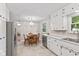 Inviting kitchen with an adjacent dining area and stainless steel appliances at 1010 Maple St, Greenwood, IN 46142
