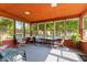 Relaxing sunroom with multiple windows offering plenty of natural light at 1010 Maple St, Greenwood, IN 46142