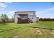 Expansive backyard with deck and stairs provides a great space to enjoy the outdoors at 10312 Gladeview Dr, Indianapolis, IN 46239