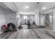 Finished basement featuring a dedicated workout area with gym equipment at 10312 Gladeview Dr, Indianapolis, IN 46239