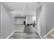 Basement area with gym equipment and ample space for activities at 10312 Gladeview Dr, Indianapolis, IN 46239