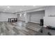 Large, finished basement with space for a dining table and workout equipment at 10312 Gladeview Dr, Indianapolis, IN 46239