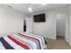 Bright bedroom with ceiling fan, carpet, and connected walk in closet at 10312 Gladeview Dr, Indianapolis, IN 46239