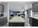 Open-concept kitchen flowing into the dining room and Gathering room, perfect for entertaining at 10312 Gladeview Dr, Indianapolis, IN 46239