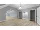 Spacious bedroom features ample natural light, hardwood floors, and modern lighting at 10398 Ethel St, Carmel, IN 46280