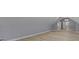 Large bedroom features wood-look flooring, closets and neutral colors at 10398 Ethel St, Carmel, IN 46280