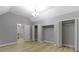 Bonus room featuring a vaulted ceiling and a view into an additional room, plus closet space at 10398 Ethel St, Carmel, IN 46280