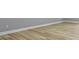 Close-up shot of hardwood flooring in a home; light and neutral color palette at 10398 Ethel St, Carmel, IN 46280
