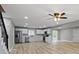 Bright kitchen with stainless steel appliances, and white cabinets at 10398 Ethel St, Carmel, IN 46280