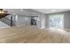 Spacious living room with hardwood floors and sliding door access at 10398 Ethel St, Carmel, IN 46280
