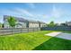 Backyard featuring a green lawn, privacy fence, and a concrete patio at 10606 Glenwyck Pl, Noblesville, IN 46060