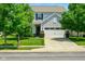 Charming two-story home with a well-maintained lawn and attached two car garage at 10606 Glenwyck Pl, Noblesville, IN 46060