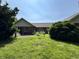 Expansive backyard with lush green lawn and a patio area, perfect for outdoor enjoyment at 10712 Downing St, Carmel, IN 46033