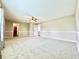 Bright bedroom featuring plush carpets, a neutral paint scheme, and natural light from windows at 10900 Clear Spring Dr, Camby, IN 46113