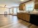 Open dining area with new floors and easy flow into kitchen and living spaces at 10900 Clear Spring Dr, Camby, IN 46113
