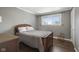 Bedroom featuring hard wood floors and a traditional wooden bed at 11603 Maze Rd, Indianapolis, IN 46259