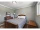 Bedroom featuring wood floors, neutral paint, and a teddy bear at 11603 Maze Rd, Indianapolis, IN 46259