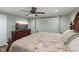 Bedroom featuring a vintage-style bed and dresser, and a ceiling fan at 11603 Maze Rd, Indianapolis, IN 46259
