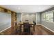 Charming dining room features hardwood floors, built-in shelving and ample natural light at 11603 Maze Rd, Indianapolis, IN 46259
