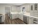 Kitchen with stainless steel appliances and granite countertops at 11603 Maze Rd, Indianapolis, IN 46259