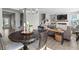Open living and dining space with hardwood floors and neutral decor at 11809 Redpoll Trl, Noblesville, IN 46060