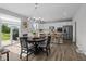 Open concept kitchen and dining area with stainless steel appliances at 11809 Redpoll Trl, Noblesville, IN 46060