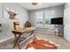 Bright home office with large windows, modern décor, and a view of the neighborhood at 11809 Redpoll Trl, Noblesville, IN 46060