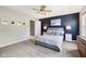 Comfortable bedroom filled with light from the window and two bedside lamps at 123 Bentree Blvd, Danville, IN 46122