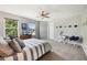 Bedroom featuring a ceiling fan, a window, and a wooden table and chair set at 123 Bentree Blvd, Danville, IN 46122