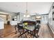 Open living area with fireplace, eat in kitchen, and views of the home's entry at 123 Bentree Blvd, Danville, IN 46122