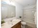 Bright bathroom featuring a vanity with a marble countertop, toilet, and a shower/tub combination with a white enclosure at 1283 Clairet, Westfield, IN 46074