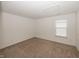 Carpeted bedroom featuring a window for natural light and neutral walls, providing a blank canvas for personalization at 1283 Clairet, Westfield, IN 46074