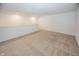 Versatile bonus room featuring plush carpeting, bright lighting, and ample space for relaxation or entertainment at 1283 Clairet, Westfield, IN 46074