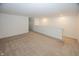 Spacious bonus room with neutral carpeting and white walls, offering a versatile area for various uses at 1283 Clairet, Westfield, IN 46074