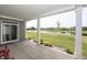 Covered patio has stone landscaping and a view of the lake and green space at 1283 Clairet, Westfield, IN 46074
