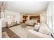 Open-concept living area with hardwood floors, fireplace, and views of the kitchen and dining area for seamless entertaining at 1283 Clairet, Westfield, IN 46074
