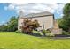 Spacious backyard featuring lawn, outdoor fireplace and patio at 1345 Lewiston Dr, Westfield, IN 46074
