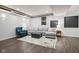 Spacious finished basement featuring a cozy living area and a separate bar area at 1345 Lewiston Dr, Westfield, IN 46074