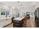 Open-concept kitchen with island, stainless steel appliances, and access to living space at 1345 Lewiston Dr, Westfield, IN 46074