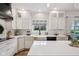 Bright and airy kitchen with subway tile backsplash and modern fixtures at 1345 Lewiston Dr, Westfield, IN 46074