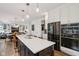 Contemporary kitchen with stainless steel appliances and stylish island seating at 1345 Lewiston Dr, Westfield, IN 46074