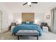 Bright main bedroom with vaulted ceilings and decoratively upholstered chairs at 1345 Lewiston Dr, Westfield, IN 46074