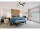 Spacious main bedroom featuring a decorative wood accent wall and a gray upholstered bench at 1345 Lewiston Dr, Westfield, IN 46074