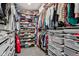 Spacious walk-in closet with organized shelving for shoes and hanging clothes at 1345 Lewiston Dr, Westfield, IN 46074